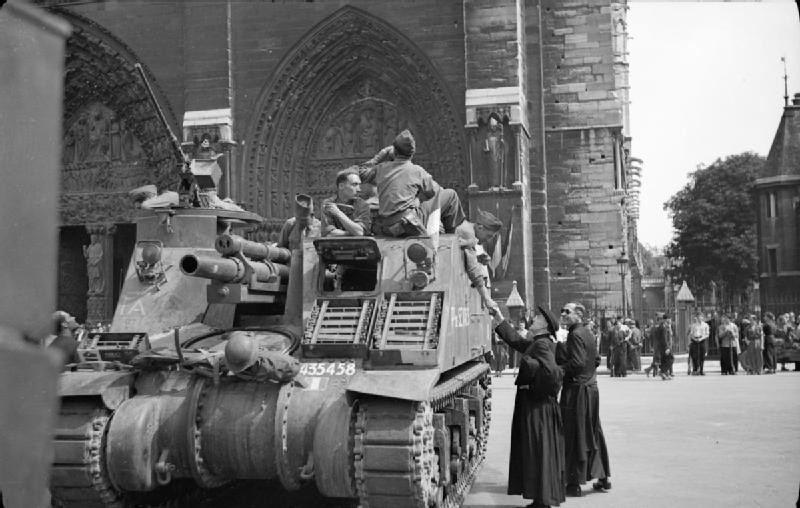 A tank of the French 2nd Armored Division in front of the Cathedral of Notre-Dame, 26 August 1944.