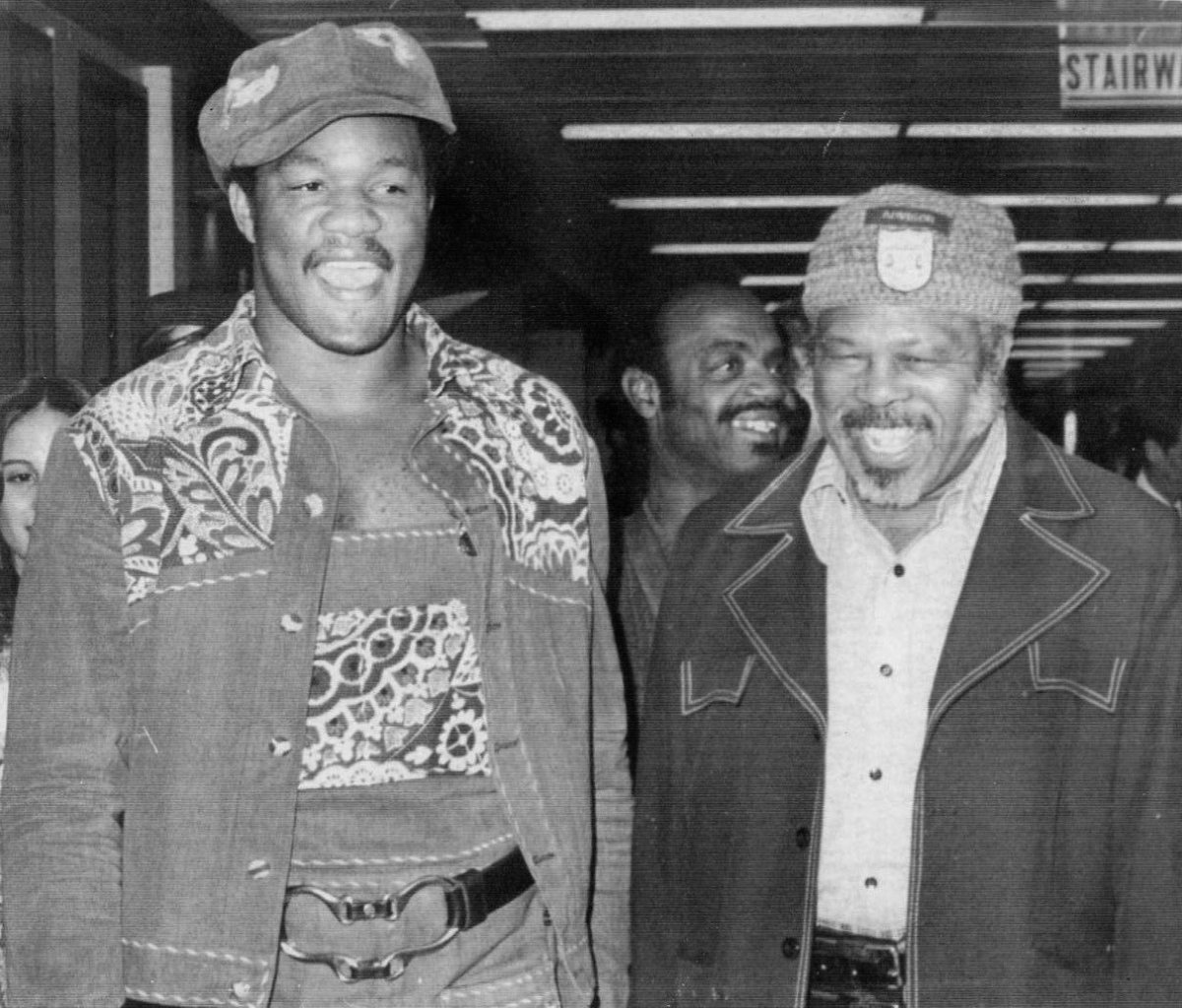 Foreman and his trainer, former champion Archie Moore, on their way to Kinshasa, 10 September 1974.