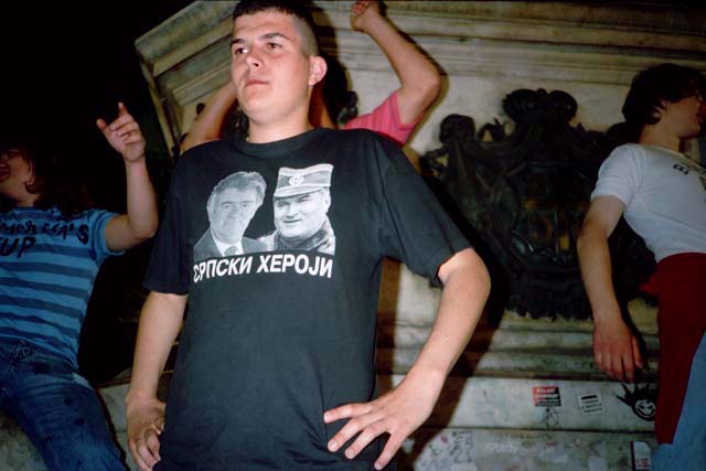 A Serbian youth wears a t-shirt that calls Radovan Karadžić and Ratko Mladić 'Serbian heroes.'