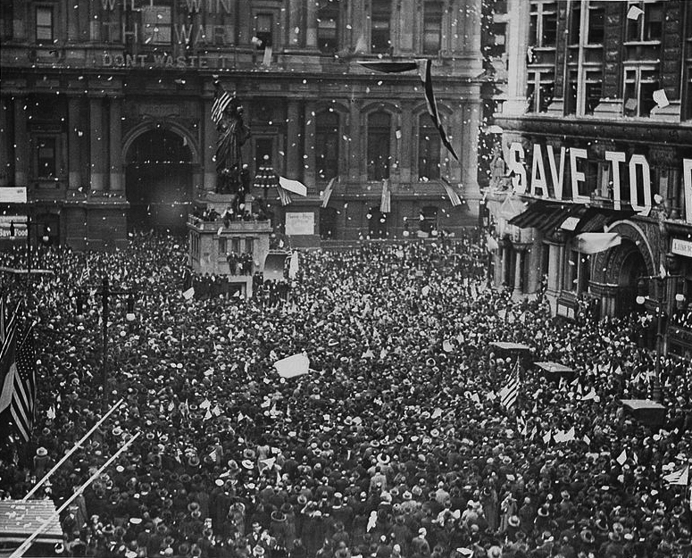 Crowds celebrate the announcement of the end of World War I in Philadelphia.