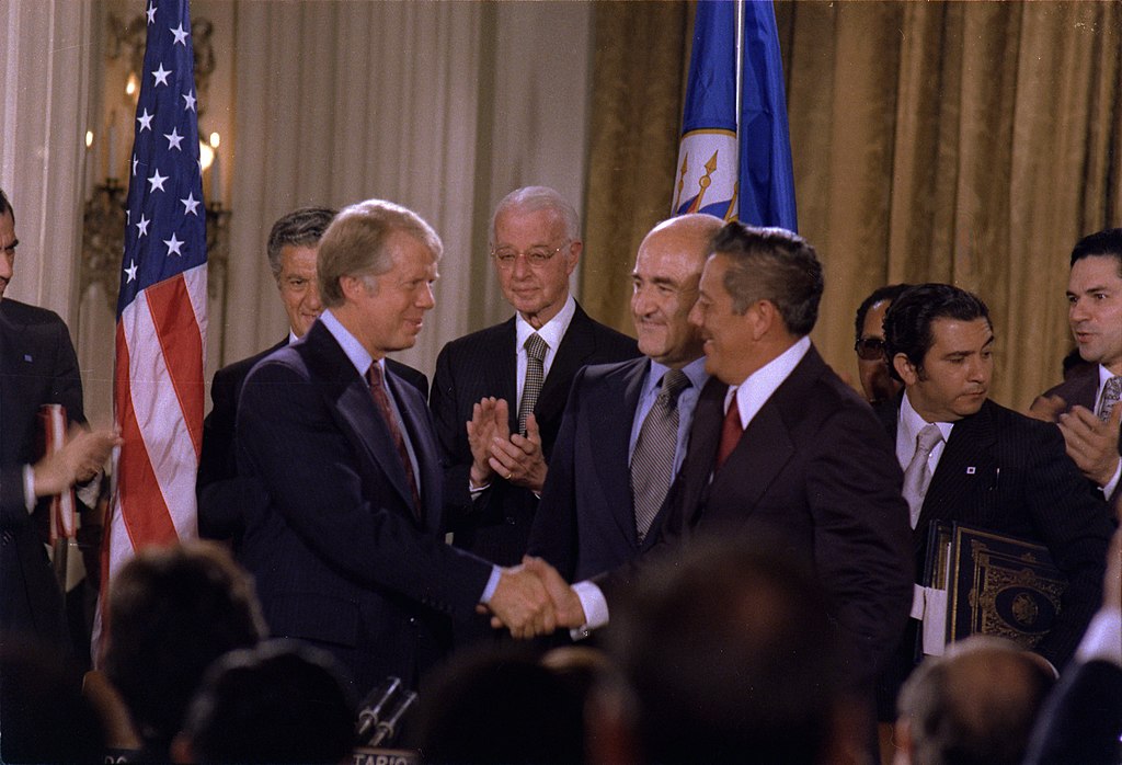 President Carter shakes hands with General Torrijos of Panama.
