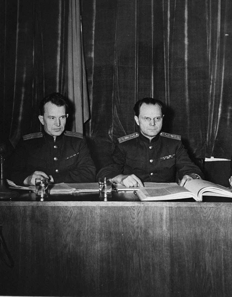 Soviet alternate judge Alexander Volchkov and Soviet judge Iona Nikitchenko.