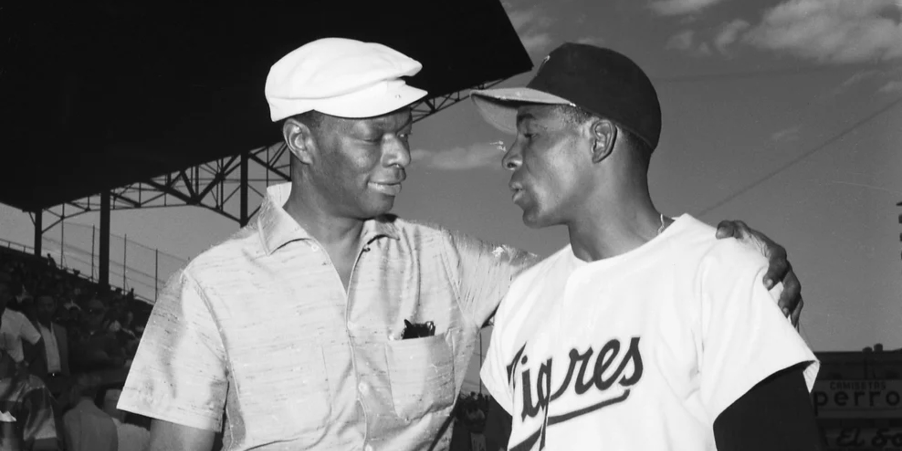 L to R - Nat King Cole and Orestes “Minnie” Minoso - Photo by Bettmann Collection/Getty Images