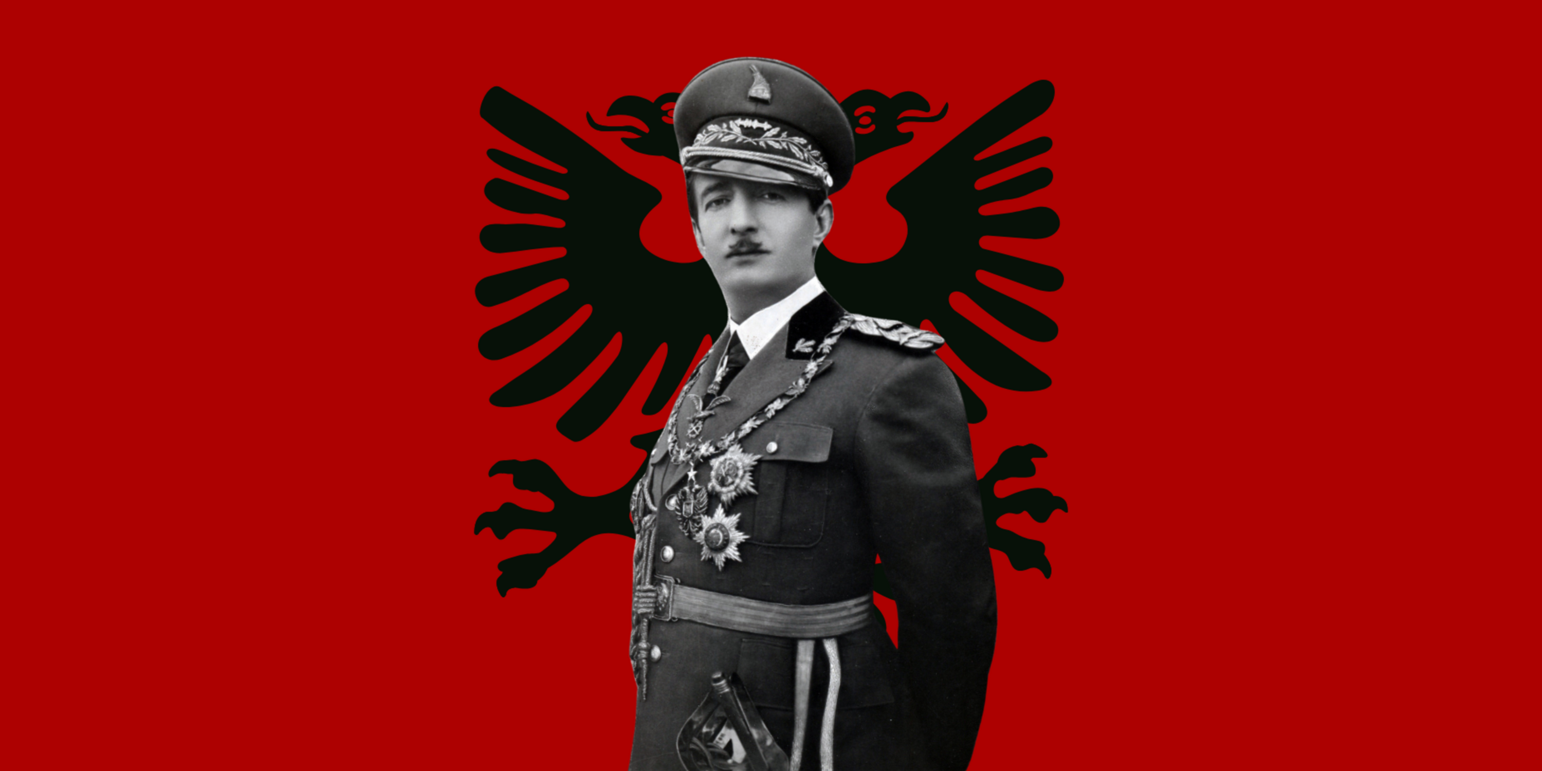 Zog I of Albania in front of the Albania Republic flag.