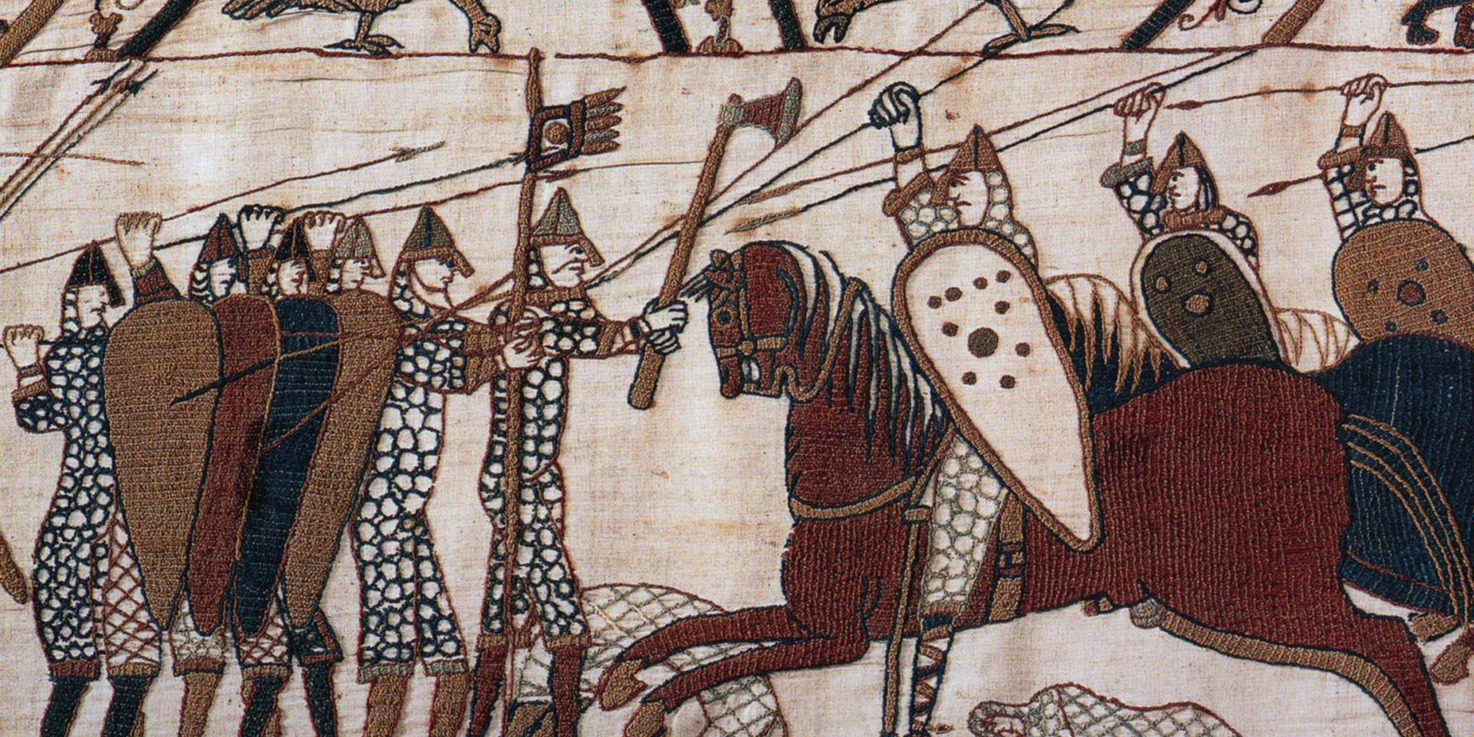 battle scene of men with axes fighting men on horseback