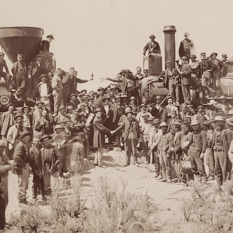 A ceremony in Promontory Summit, UT in 1869 for the completion of the First Transcontinental Railroad.