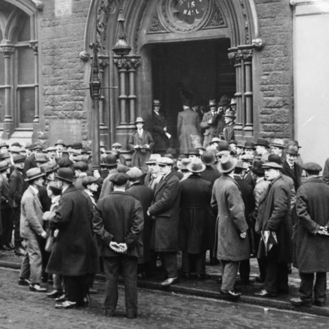 Unemployed people in front of a London workhouse.