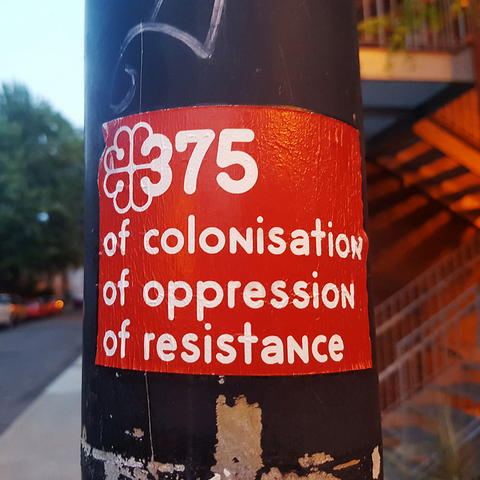 A 2017 sign in Montreal emphasizing the 375 years of colonization, oppression, and resistance since European arrival.