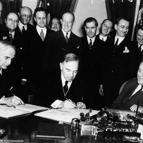 Leaders signing the U.S.-Canada Trade Agreement in 1935.
