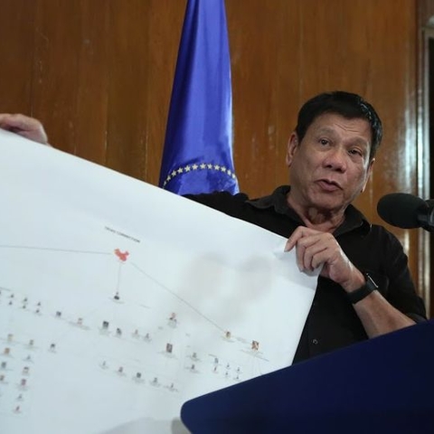 President Rodrigo Duterte presenting a chart supposedly illustrating a drug trade network.