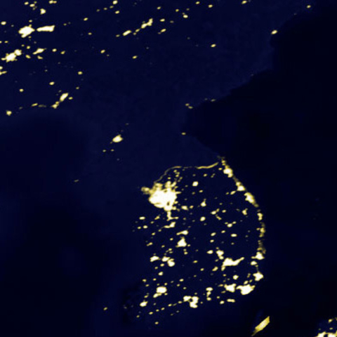 The Korean Peninsula at Night via satellite. Note the single cluster of lights around Pyongyang.