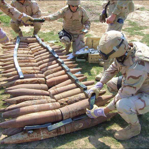 A Bosnian and Herzegovinan explosive ordinance disposal unit prepare to explode a stash of Iraqi artillery found in Asal Belly, east of Ad Diwaniyah, Iraq-Feb 2008  