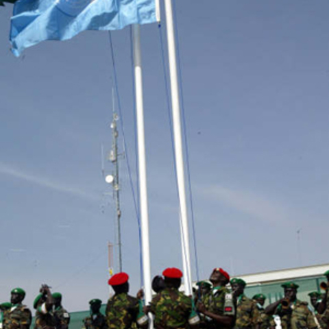 AU-UN flags are raised jointly to mark the beginning of the joint UN-AU peacekeeping operation. 31 December 2007.
