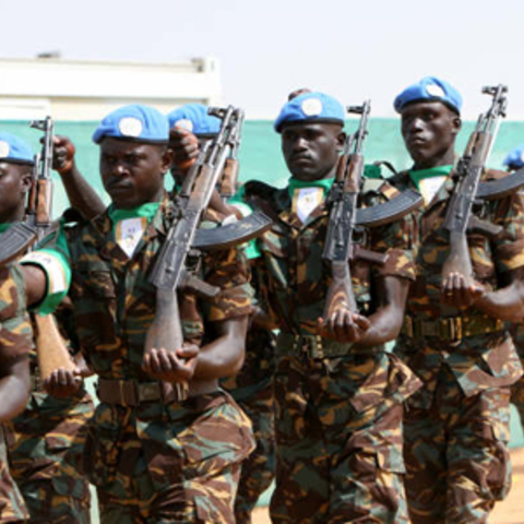 Former African Union peacekeepers from Gambia in their new UN blue berets and African Union armbands.
