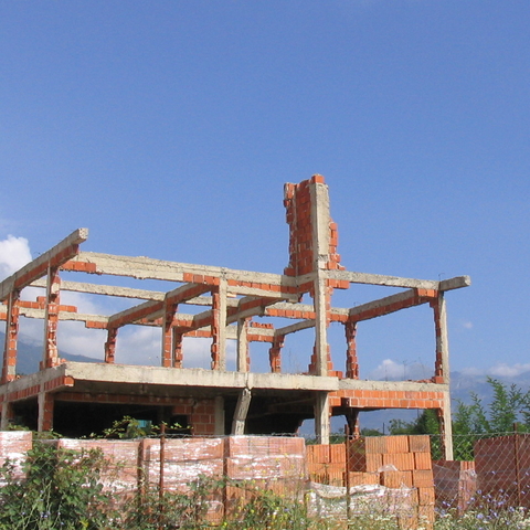 Home destroyed by the waves of violence in the 1999 war. Northwest Kosovo, July 2005  