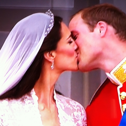 A royal marriage for love: Kate Middleton and Prince William kiss on the balcony of Buckingham Palace following their wedding on April 29, 2011  