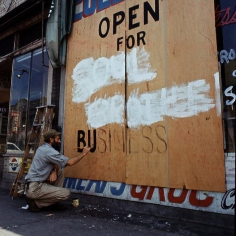A boarded up shop in the wake of the late 1960s riots in Detroit  