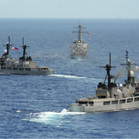 Philippine and US Navy ships conducting exercises.