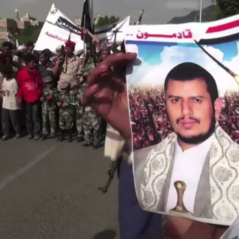 An image of Hussein al-Houthi at a protest over Saudi-led airstrikes in 2015.