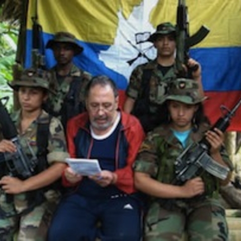 FARC soldeirs with a kidnapped member of Congress in 2002.