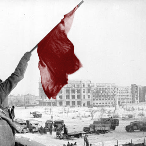 A Soviet Soldier Waves the Red Banner