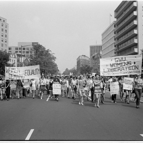 Group of women marching with signs: "GWU Women's Liberation," "I'm a second-class citizen," "Women demand equality"