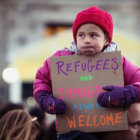 Protestors against the U.S. Trump administration voice their commitment to the world's dispossessed.