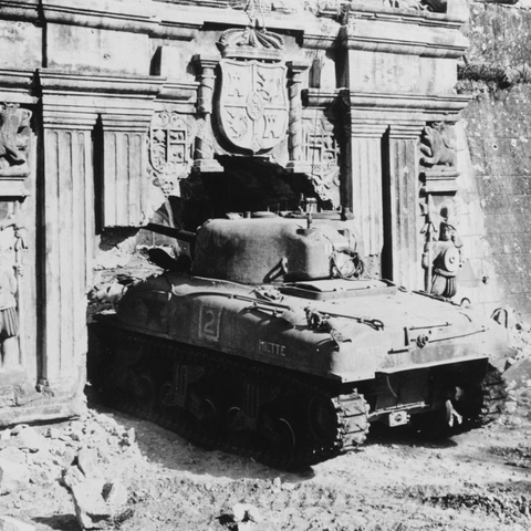 A Sherman tank enters Fort Santiago
