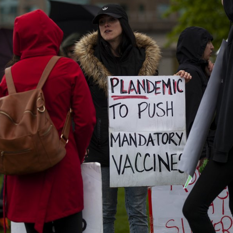 A COVID-19 anti-lockdown protestor in Vancouver, Canada, May 2020