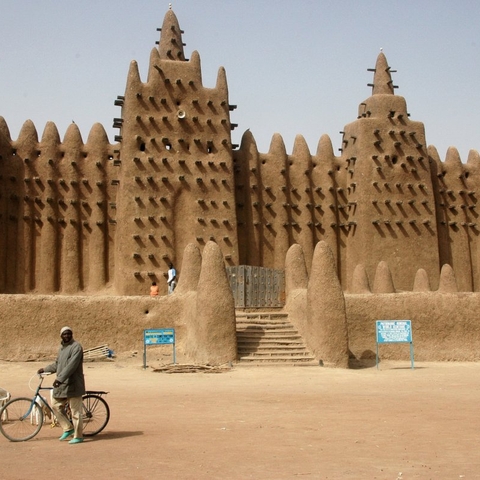 The Great Mosque of Djenne. This image illustrates the influence of Islam in the region and the building style of the region. Its origins are unknown but it shows the power of the emperors who built this structure that still stands today.
