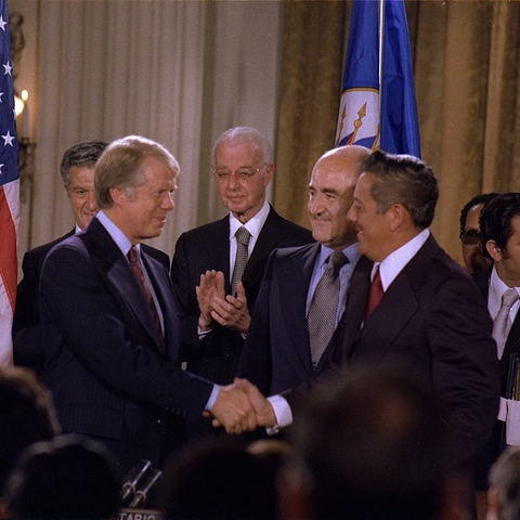 President Carter shakes hands with General Torrijos of Panama after signing the Panama Canal Treaty