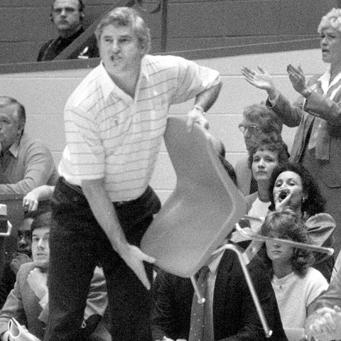 Coach Bob Knight holding a chair