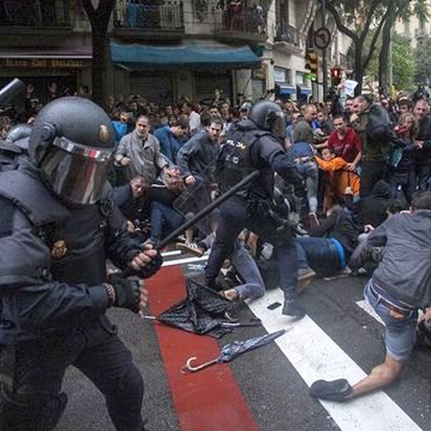 Nationalist police forces in Barcelona preventing voting in the October 1, 2017 referendum.