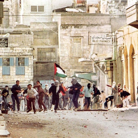 Palestinians during the first intifada, 1987. (Photo by Peter Stepan)