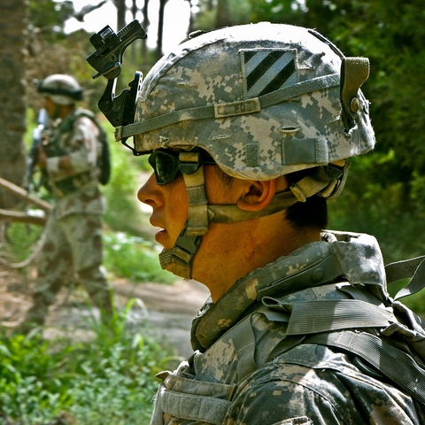 American soldier conducting patrol with an Iraqi soldier.