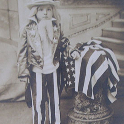 Young Child dressed in a Uncle Sam costume 