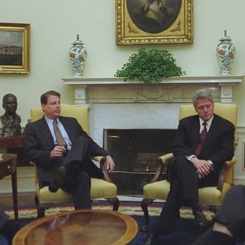 President Clinton and Vice President Gore sitting in the Oval Office in 1996.