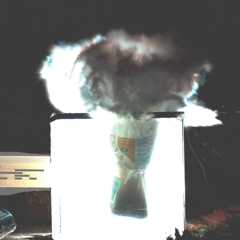 A dry ice bomb mid-explosion.