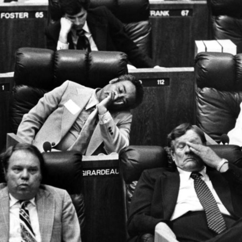 Legislative members are seen exhausted while listening to lengthy testimony during floor action on the articles for impeachment of judge Sam Smith.