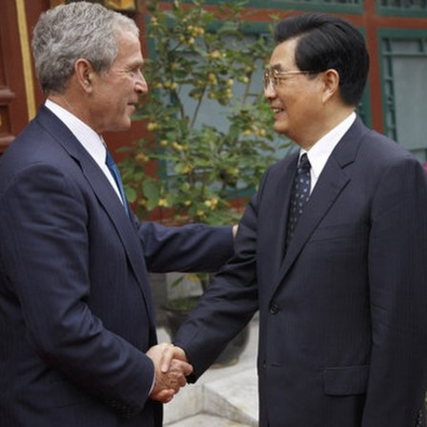 President George W. Bush shakes hands with China's President Hu Jintao following his visit and meeting Sunday, Aug. 10, 2008, with the Chinese leader at Zhongnanhai, the Chinese leaders compound in Beijing.