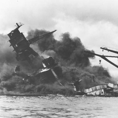 Burning ships after the Japanese attack of Pearl Harbor.