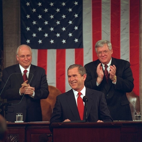 President George W. Bush addressing Congress in 2001 with Vice President Dick Cheney and House Speaker Dennis Hastert standing behind him.