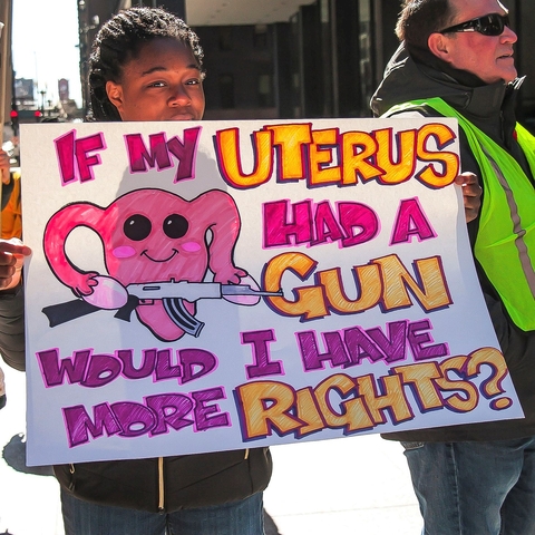 Poster from a 2020 pro-choice rally that says, "If my uterus had a gun, would I have more rights?"