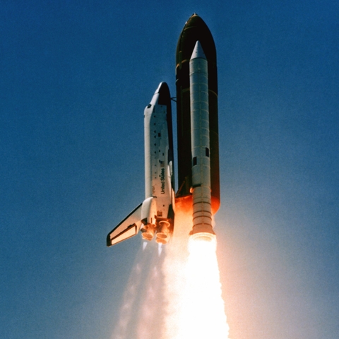 The NASA Space Shuttle Challenger launching in 1983.