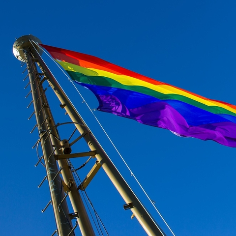 The Pride Flag being hoisted onto the Space Needle in Seattle, Washington.