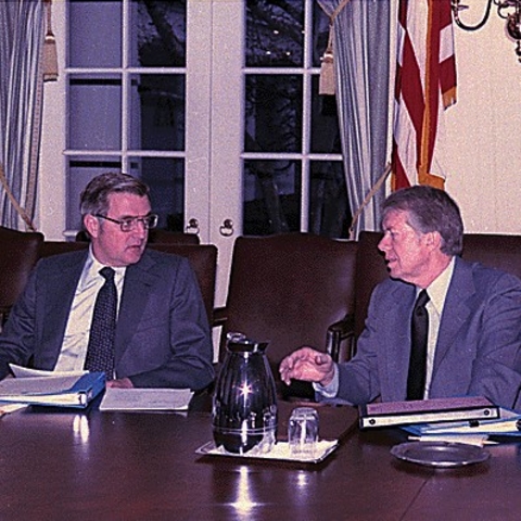 Vice President Walter Mondale speaking with President Jimmy Carter.