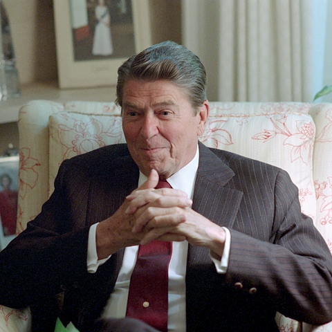 President Ronald Reagan sitting in the Oval Office Study in 1985.