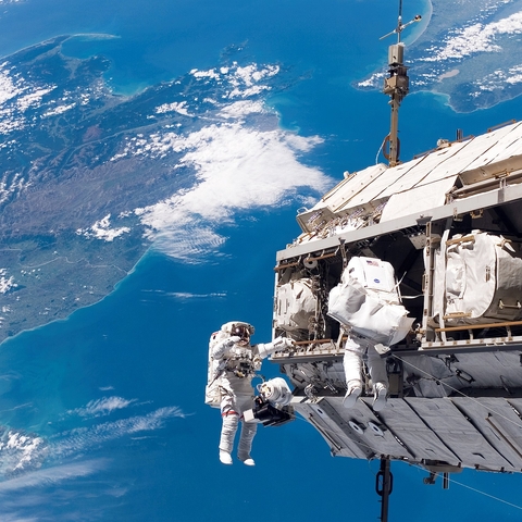 STS-116 mission specialists, NASA astronaut Robert Curbeam and ESA astronaut Christer Fuglesang perform extravehicular activity (EVA) during construction of the International Space Station.