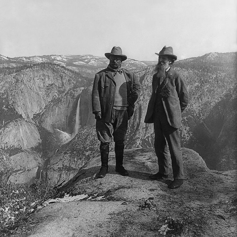 U.S. President Theodore Roosevelt (left) and nature preservationist John Muir, founder of the Sierra Club, on Glacier Point in Yosemite National Park. In the background: Upper and lower Yosemite Falls.
