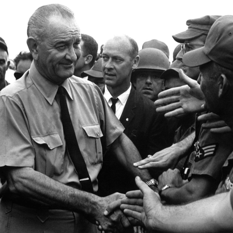 Lyndon Johnson greets American troops in Vietnam 1966.